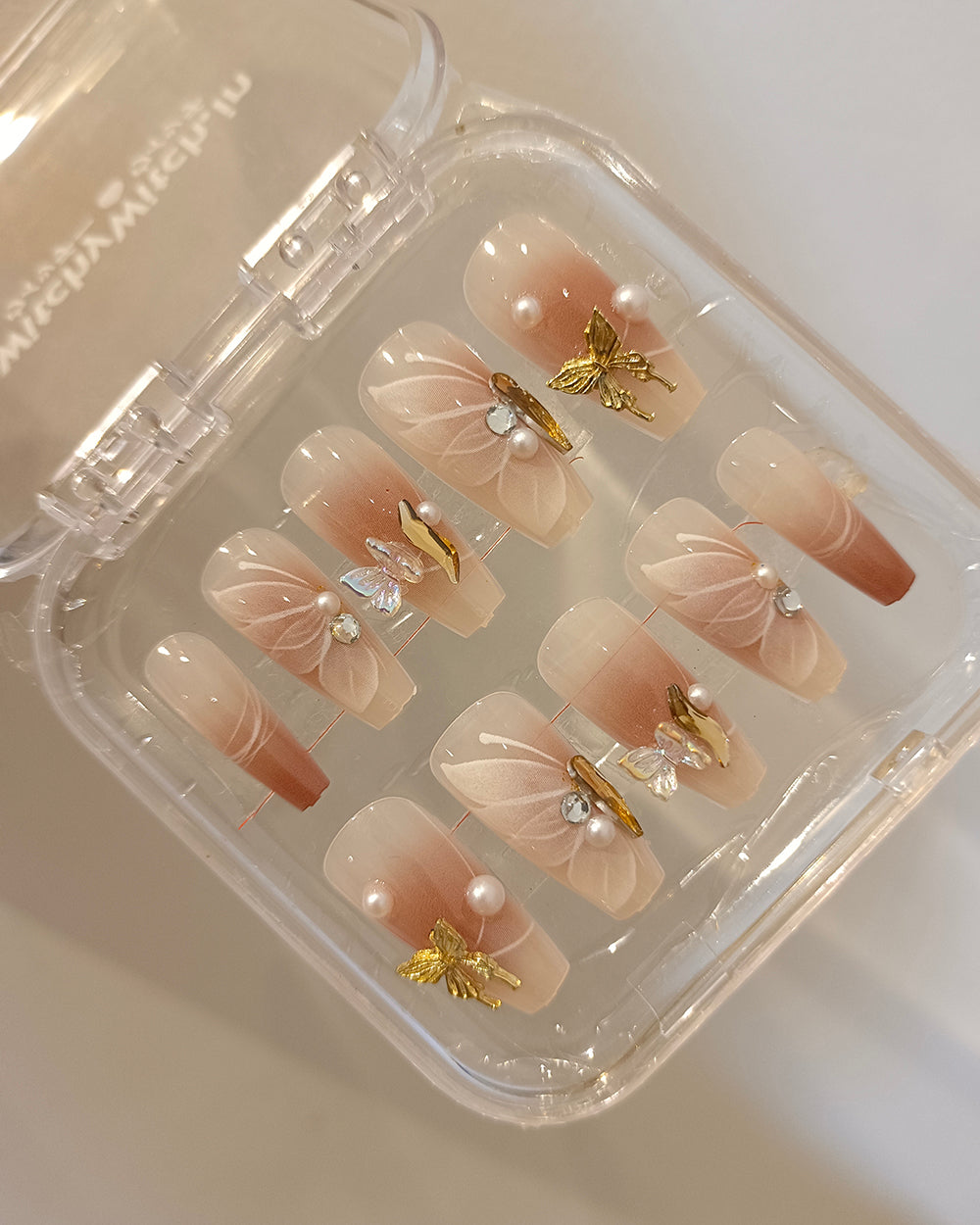 BUTTERFLY VEIL CLAWS