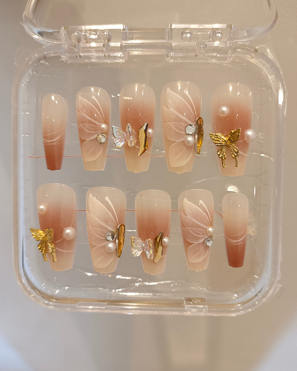 BUTTERFLY VEIL CLAWS