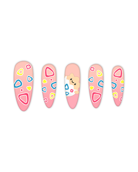 Long Almond press-on nails with pastel pink base featuring colorful abstract shapes and a cute cartoon bear design – kawaii-inspired artificial nails, glue-on fake nails, playful nail art for kids and teens.