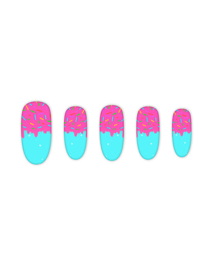 Oval-shaped press-on nails with dripping pink frosting and colorful sprinkles over a sky blue base – candy-inspired artificial nails, fake nails, glue-on nails for sweet-themed nail art looks.
